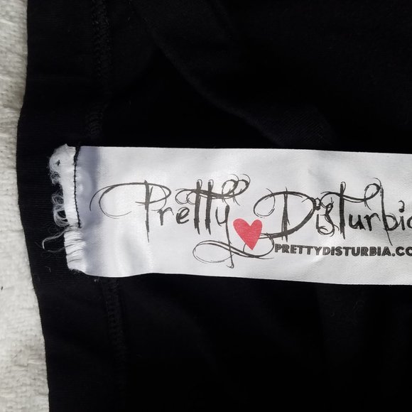 Black leggings with applique knee patches - Picture 3 of 4